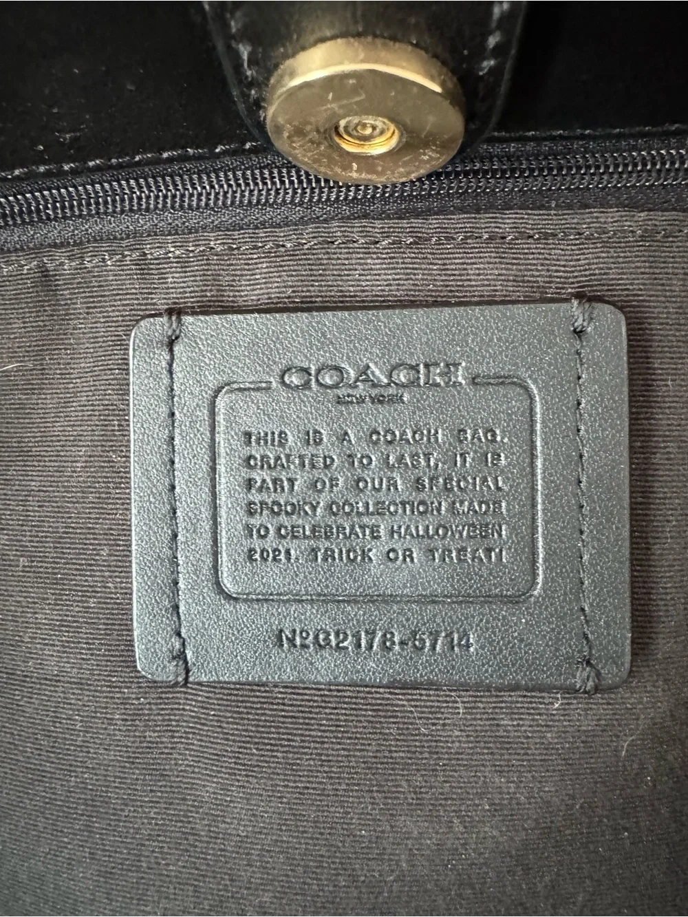 Coach Brown Signature Canvas Tote with Black Straps and Halloween Motifs